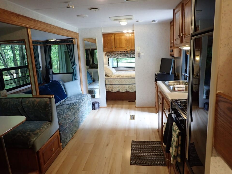 New wood flooring substantially updates the Bunkie space. The master bedroom mattress is also brand-new (2019)