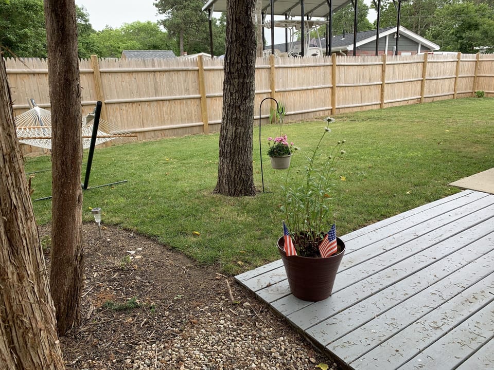private yard, double hammock and patio