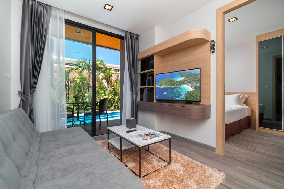 One Bedroom Deluxe with Plunge Pool | Living room | 40-inch LED TV with satellite channels, TV