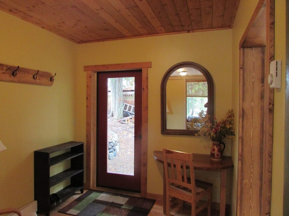 Front entrance with computer desk.