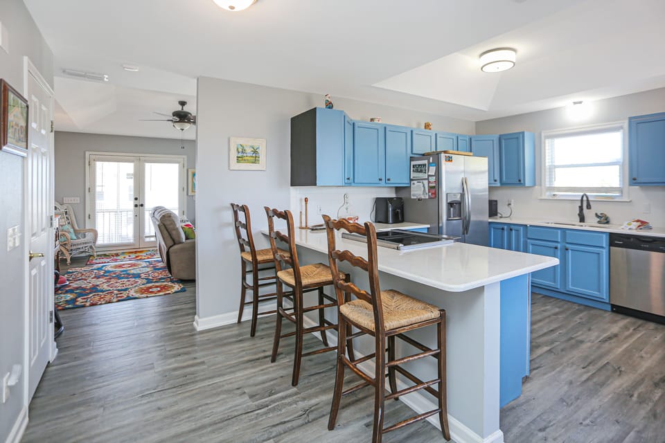 Kitchen Area Opens Up to Living Room
