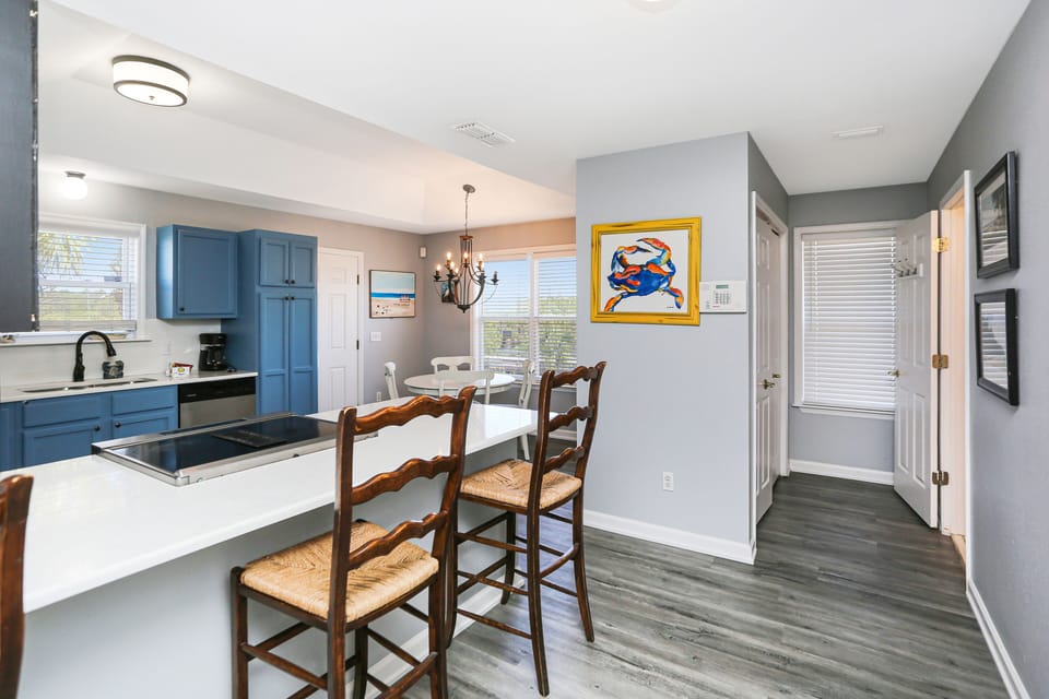Kitchen & Dining Area with Full Bath & Laundry Room