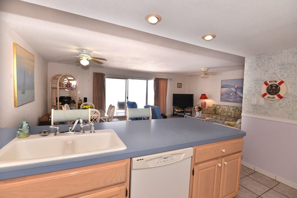 See the Gulf Outside the Patio Door While Cooking in the Kitchen