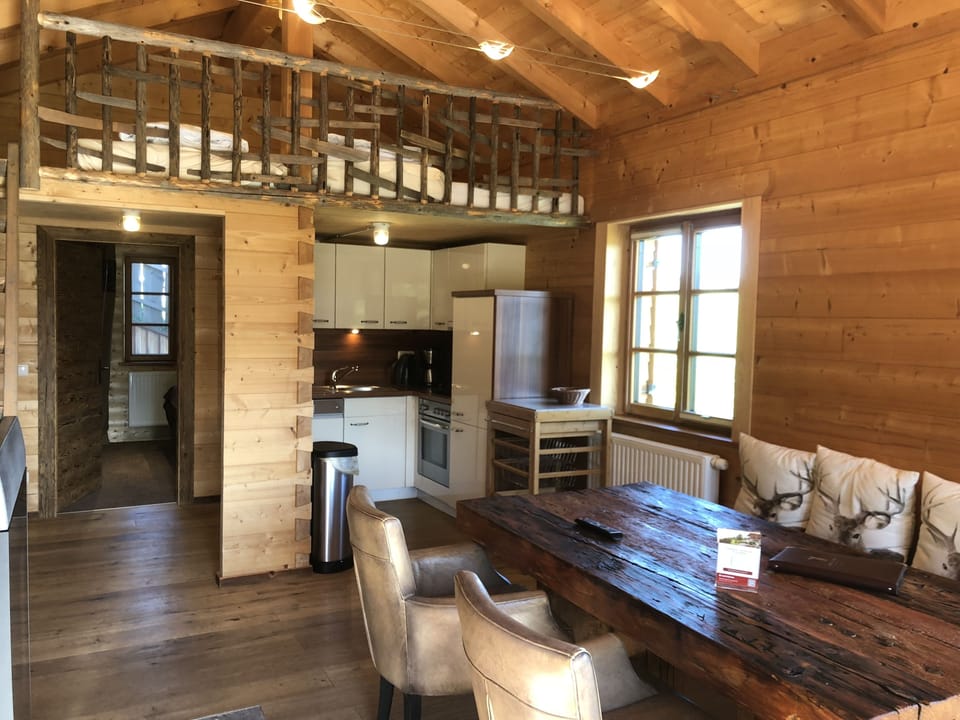Luxury Chalet, 1 Bedroom, Fireplace, Pool View | Living area | Flat-screen TV