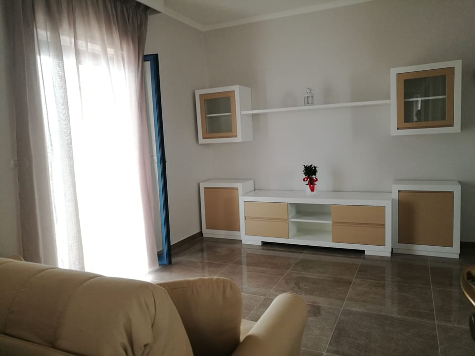 Apartment, 2 Bedrooms | Living room | Flat-screen TV