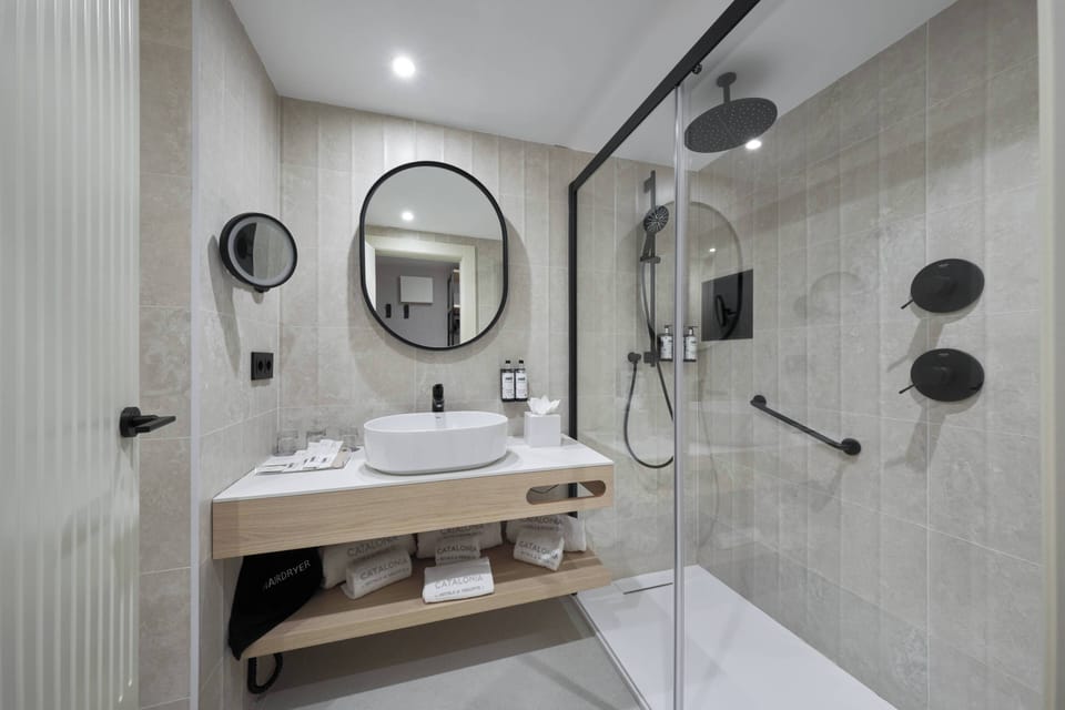 Eco-friendly toiletries, hair dryer, towels