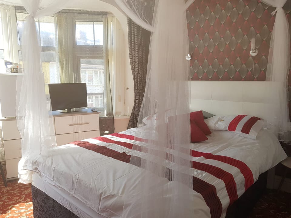 Family Double or Twin Room, Private Bathroom | Down comforters, individually decorated, individually furnished