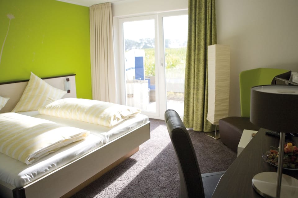 Desk, laptop workspace, free WiFi, bed sheets