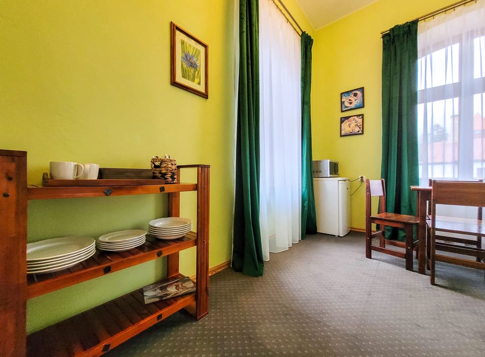 Family Studio Suite, 2 Bedrooms, Non Smoking, Balcony | In-room dining