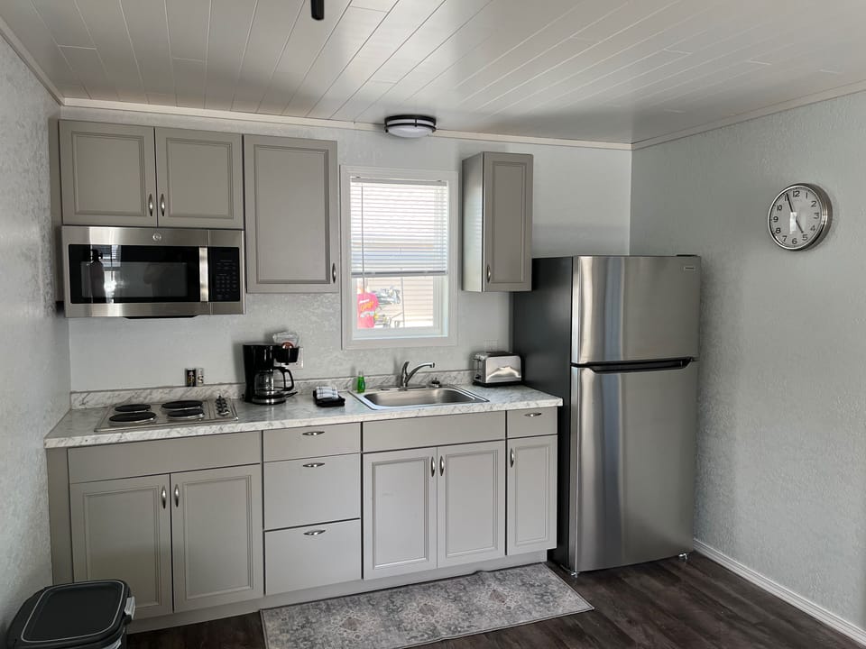 Fridge, microwave, stovetop, coffee/tea maker