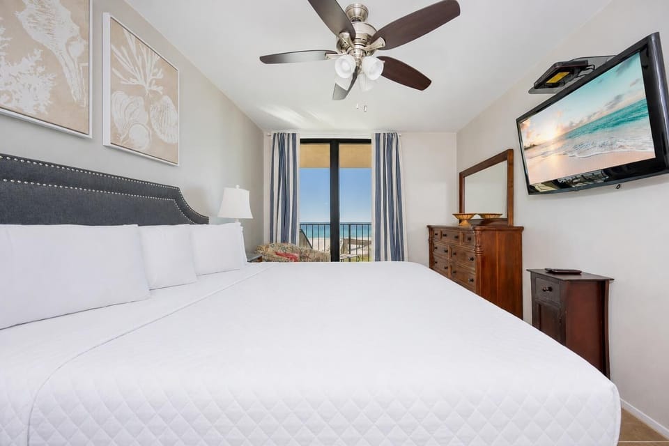 Rest into your king master suite with gentle breezes and beach views from your balcony