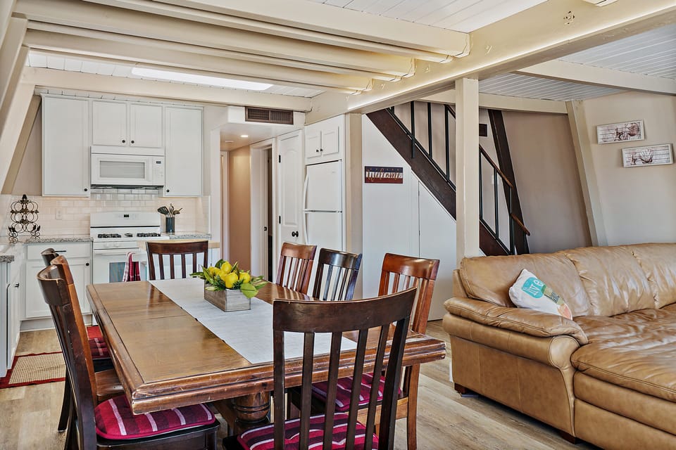 Dining table for eight; plus four TV trays if someone wants to sit elsewhere.