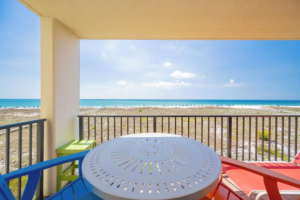 Breathe in the fresh coast air while lounging on your balcony, soaking up the stunning beach views ahead