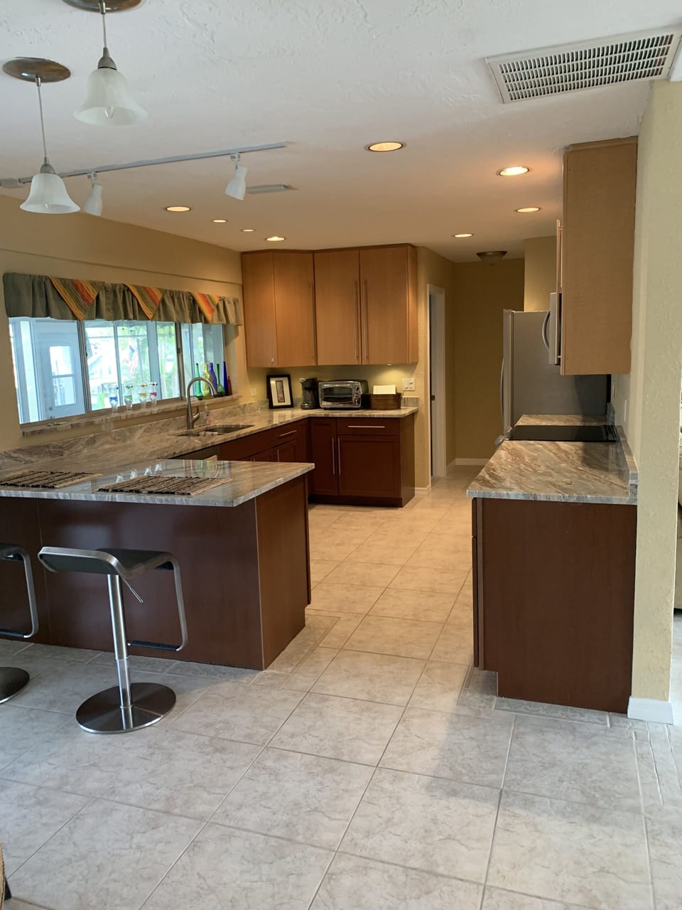 Beautiful extra large kitchen was updated with appliances & granite countertops.