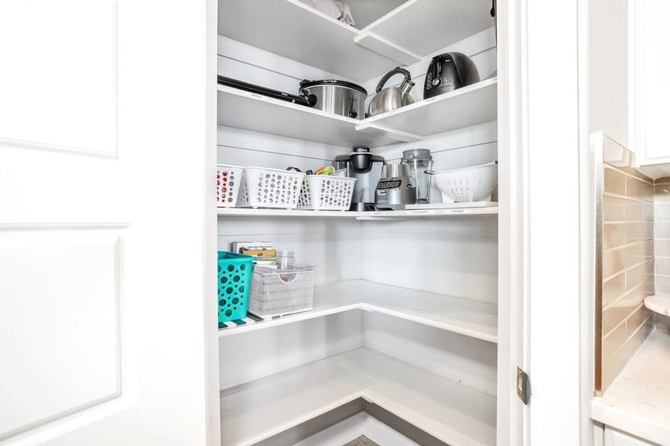 Fully stocked kitchen pantry featuring all the comforts of home