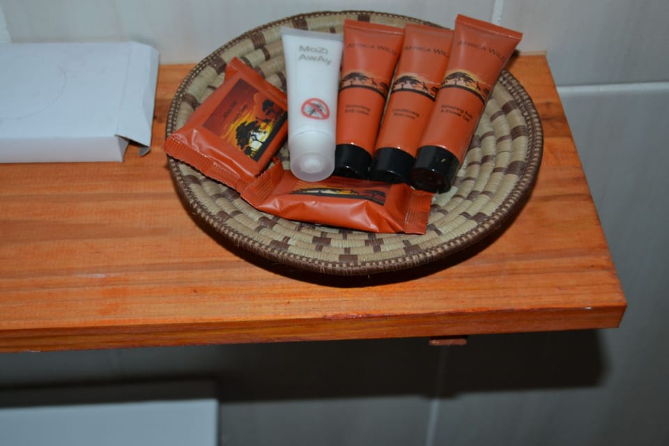 Family Suite, 2 Bedrooms, Garden View, Garden Area | Bathroom amenities | Free toiletries, bathrobes, towels