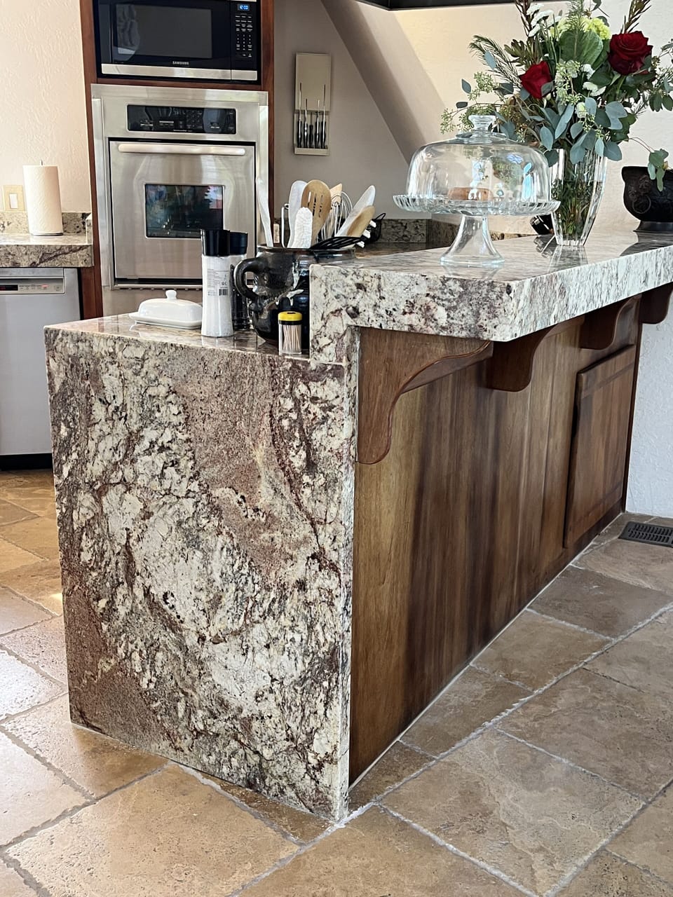 Waterfall edge, oven is both standard and convection, microwave above