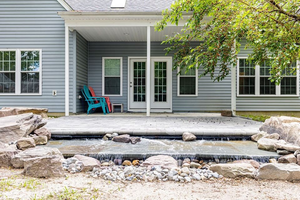 Backyard patio, with water garden.