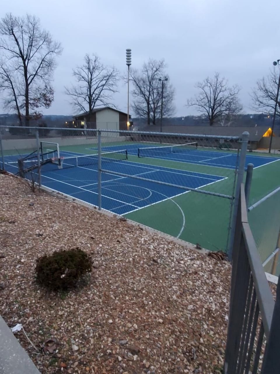 Basketball and Tennis Courts near the pool area
