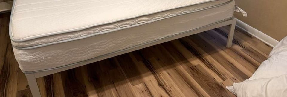 King bed mattress is memory foam with attached topper