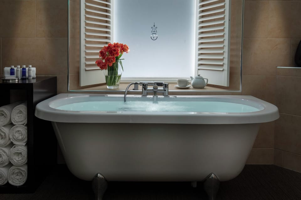Decadent | Bathroom | Separate tub and shower, deep soaking tub, rainfall showerhead