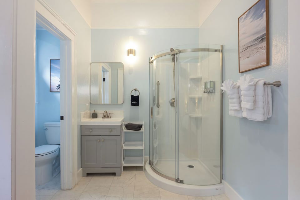 Cypress & Sea Room | Bathroom | Combined shower/tub, jetted tub, hydromassage showerhead, hair dryer
