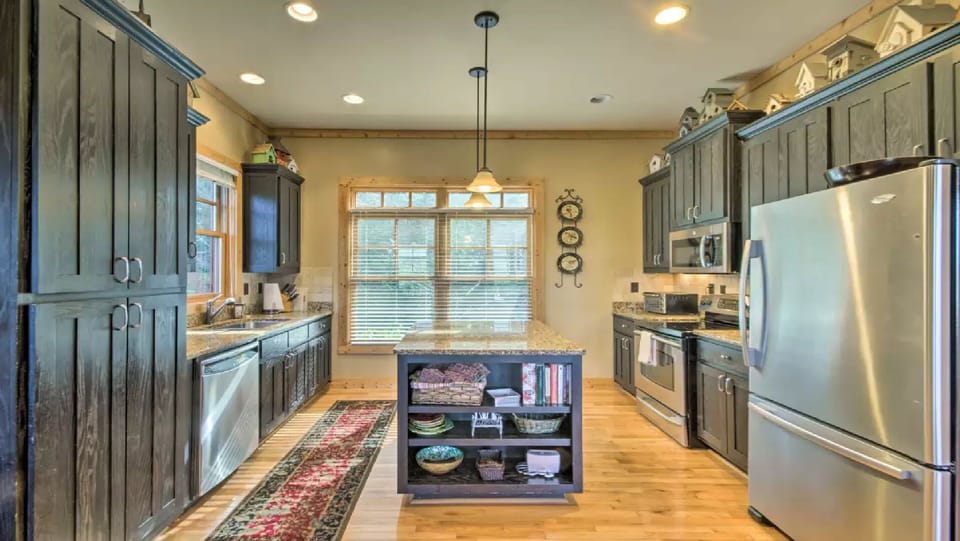 Kitchen: Smooth Cooktop Stove/oven, Microwave, mini-oven, DW, plenty of cookware