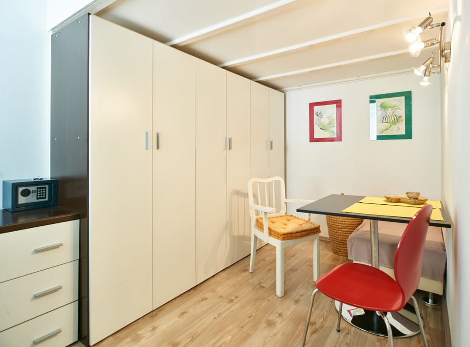 Apartment, 1 Bedroom | Living area | Flat-screen TV, DVD player