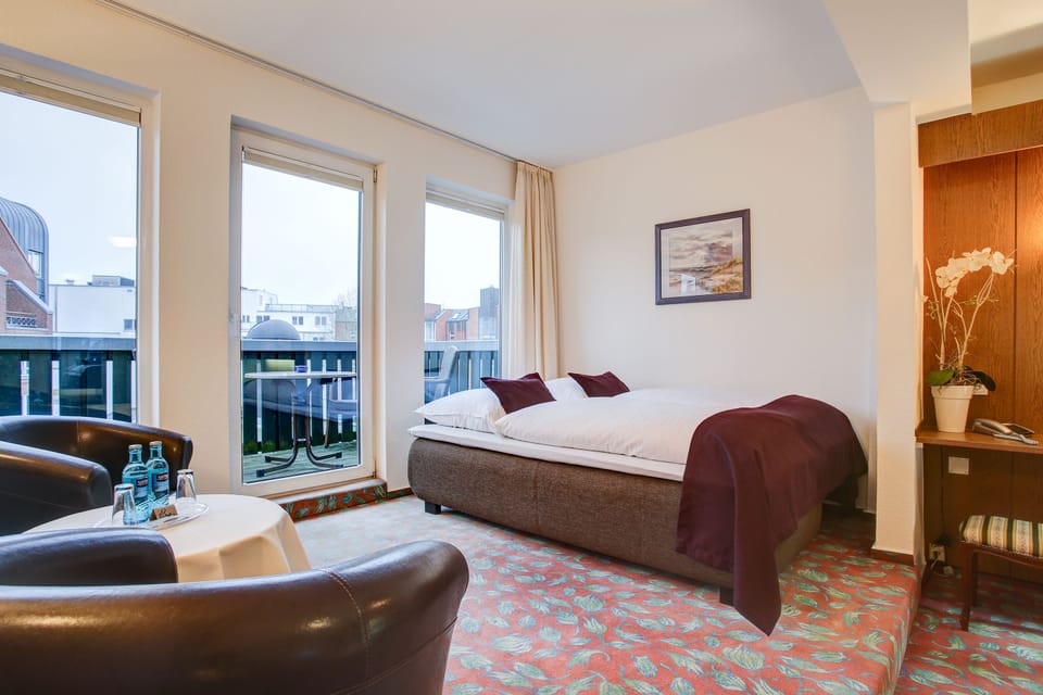 Quadruple Room | Desk, iron/ironing board, free WiFi, bed sheets