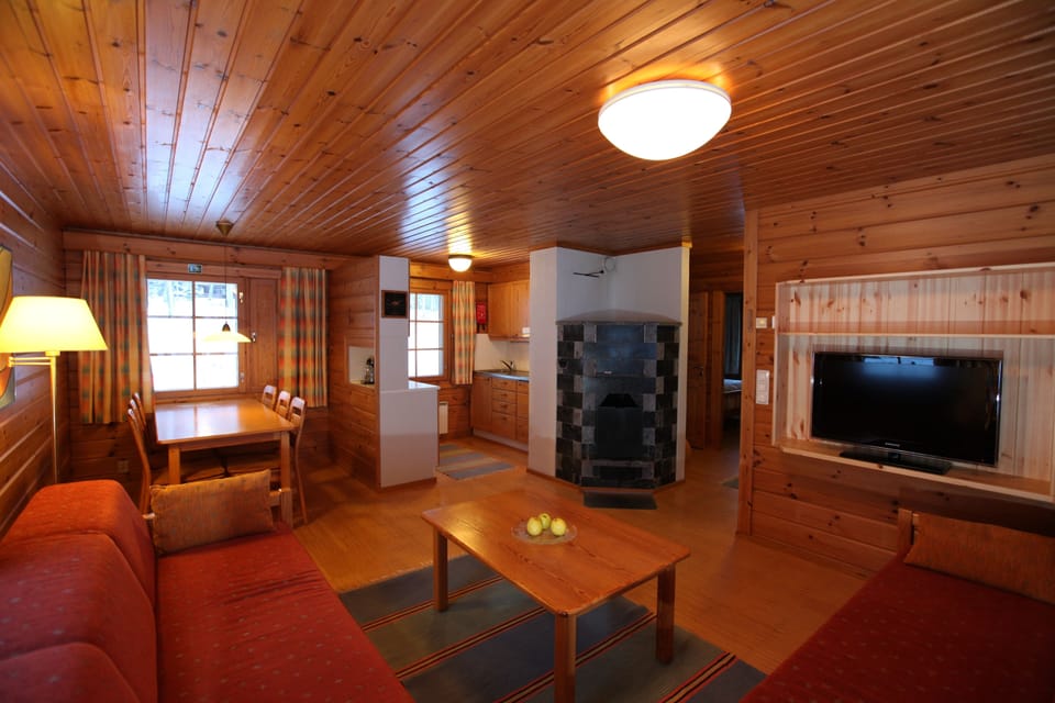 Traditional Bungalow, 2 Bedrooms, Partial Lake View | Living area | 100-cm flat-screen TV with satellite channels, TV, fireplace