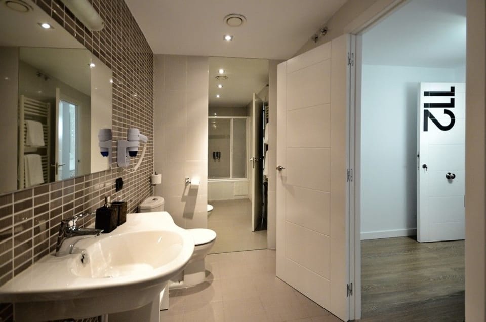 Superior Double Room | Bathroom | Designer toiletries, hair dryer, towels
