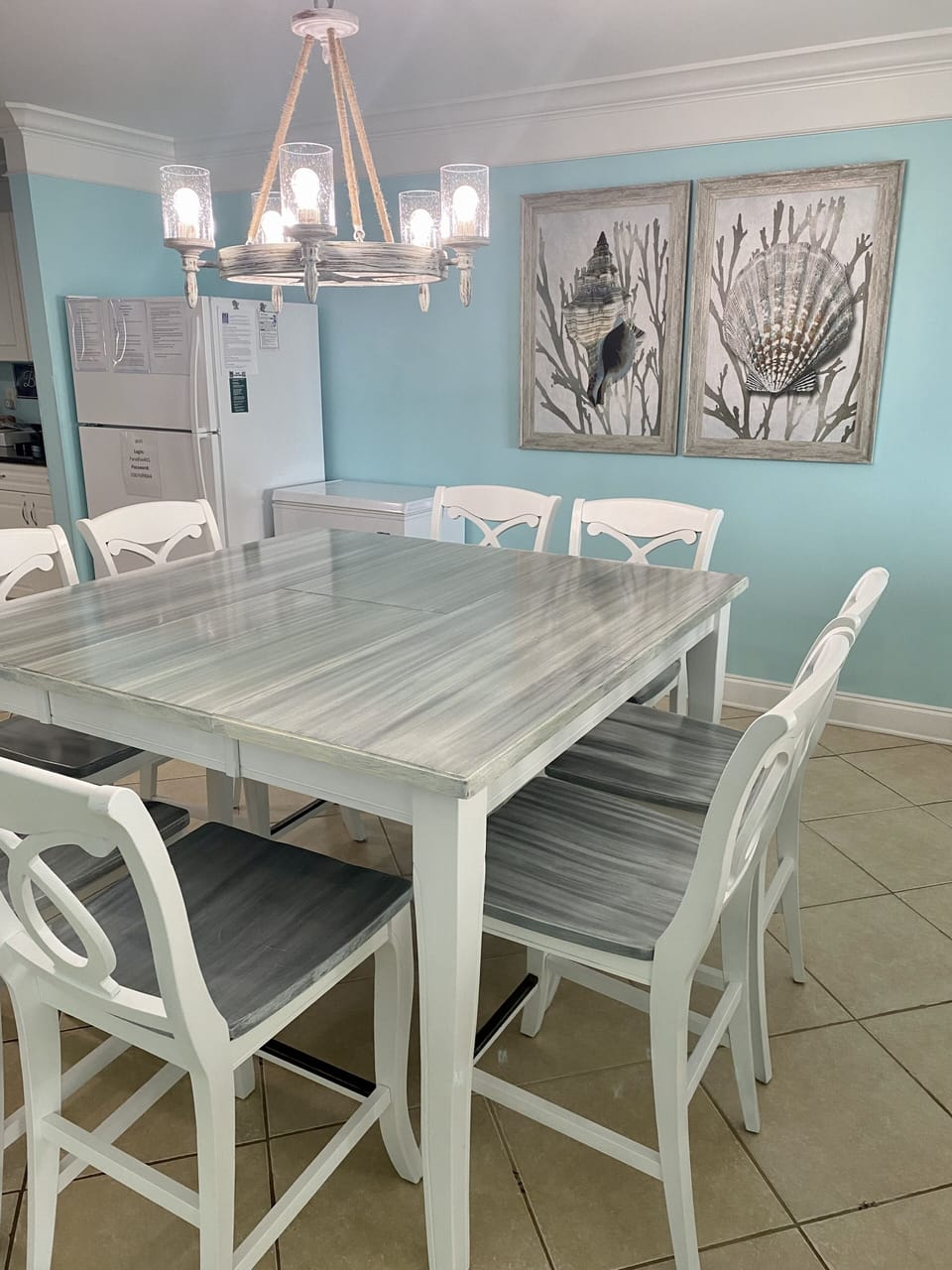 Bar top table with 8 chairs.