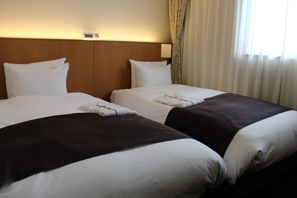 Down comforters, desk, blackout drapes, free WiFi