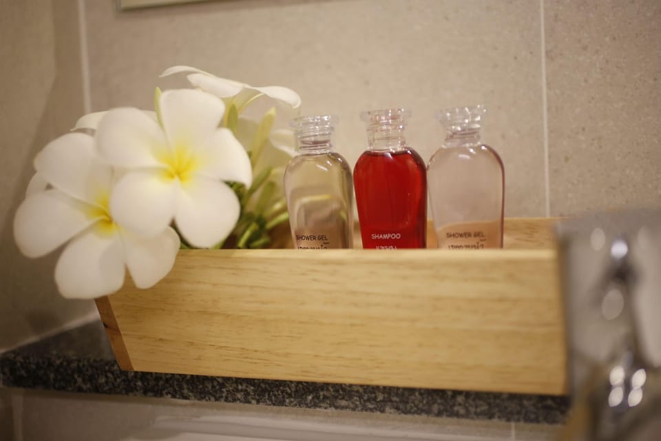 Shower, free toiletries, hair dryer, slippers