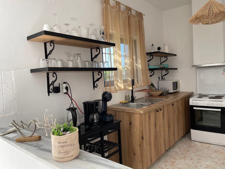 Premium Bungalow, 2 Bedrooms, Non Smoking, Beachfront | Private kitchen | Fridge, electric kettle, freezer, dining tables