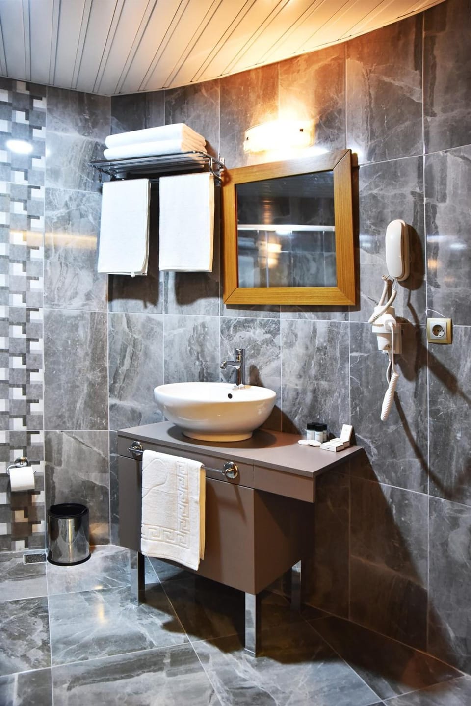 Shower, free toiletries, hair dryer, slippers