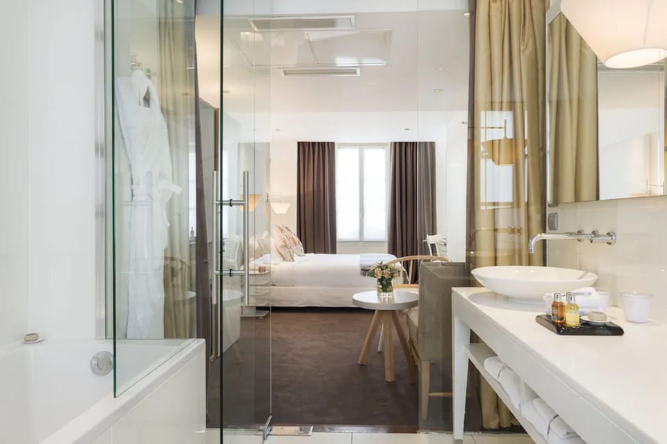 Premium bedding, down comforters, minibar, in-room safe