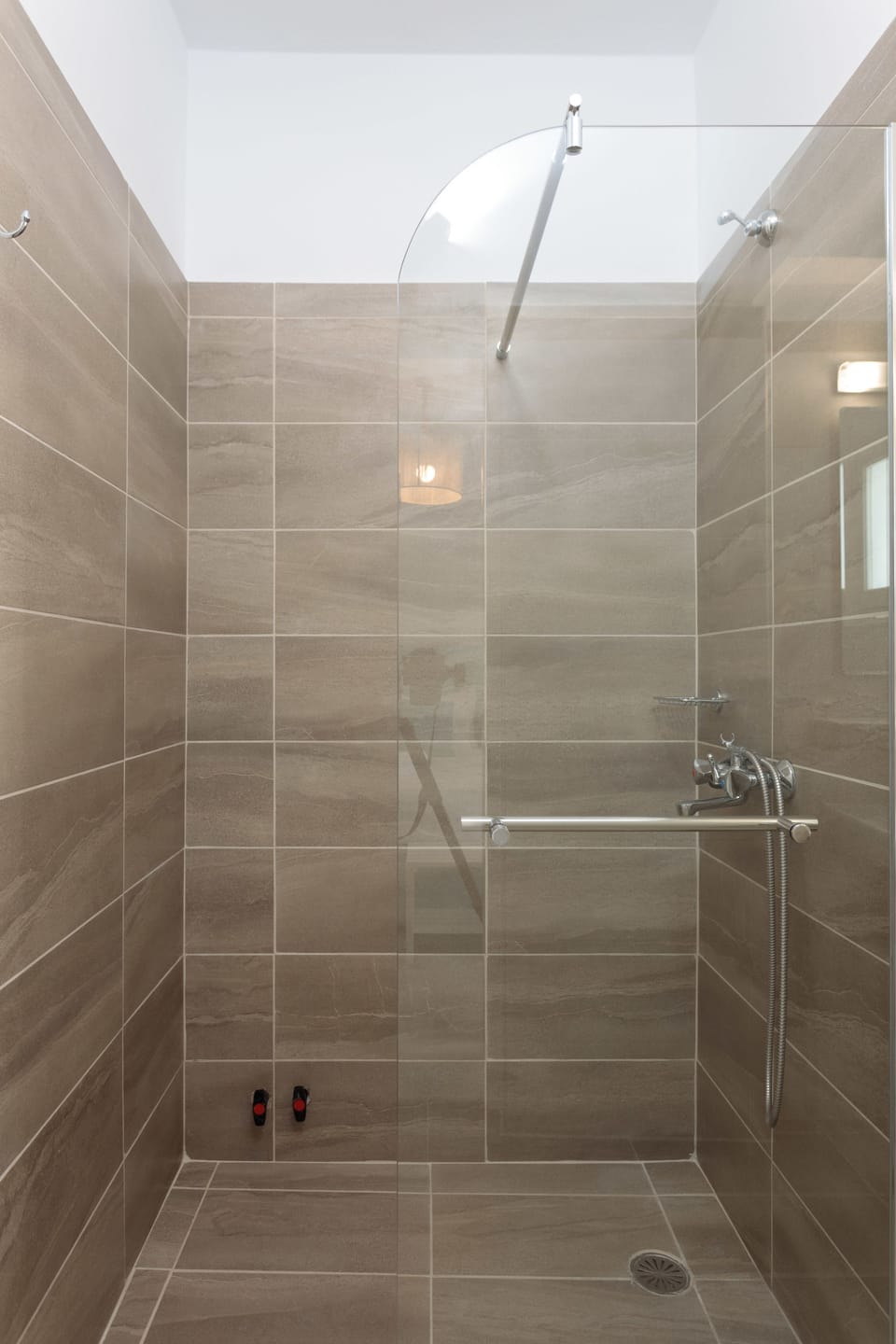 Shower, free toiletries, hair dryer, slippers