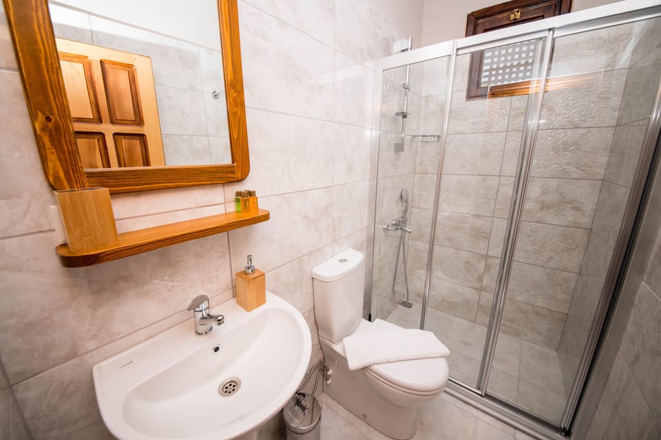 Shower, rainfall showerhead, eco-friendly toiletries, hair dryer