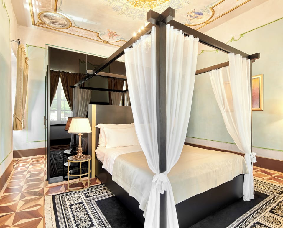 Historical Room | Minibar, in-room safe, individually decorated, desk