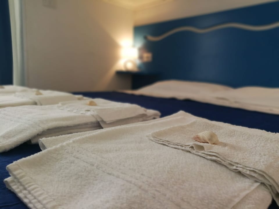 Family Room | Premium bedding, minibar, in-room safe, individually decorated