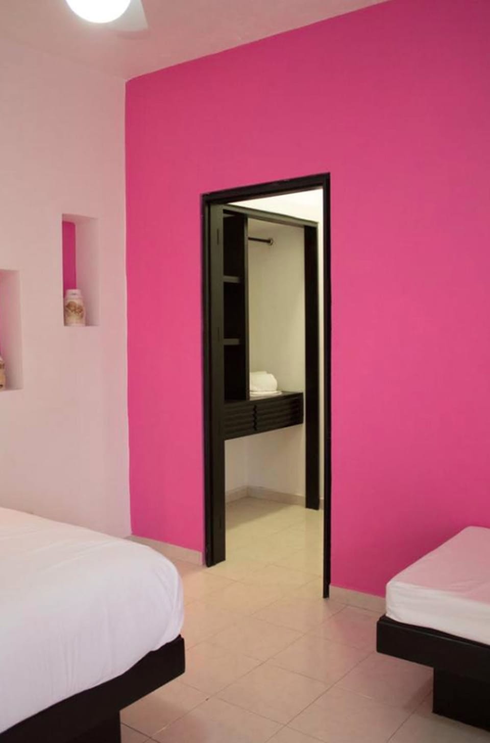 Deluxe Room, Multiple Beds, Pool View, Garden Area | Bathroom | Shower, free toiletries, towels