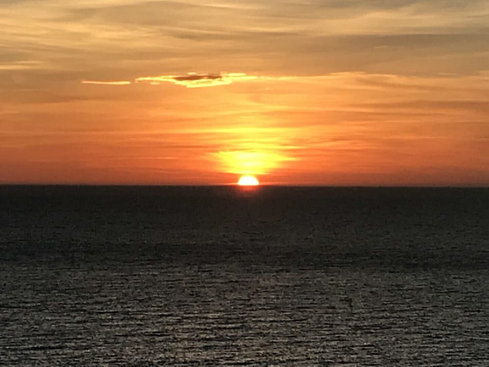 Nearby oceanfront sunsets and campfires