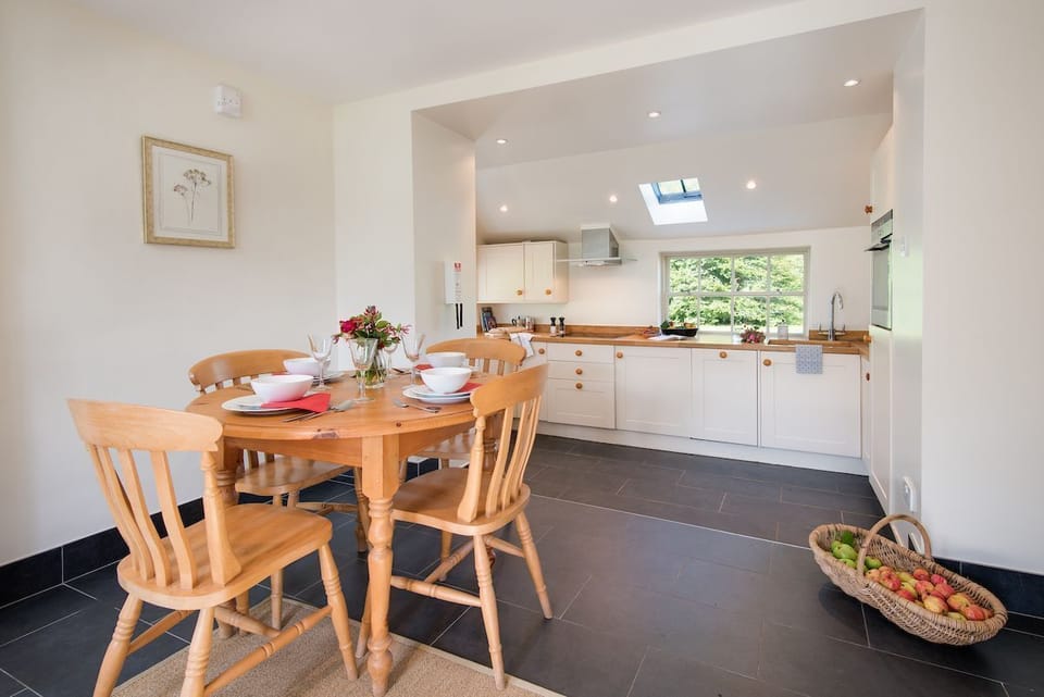 Garden Cottage, Teviot Bank - kitchen and dining area with seating for four guests