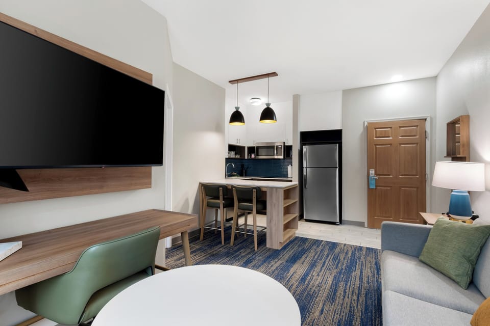 Desk, iron/ironing board, travel crib, WiFi (free)