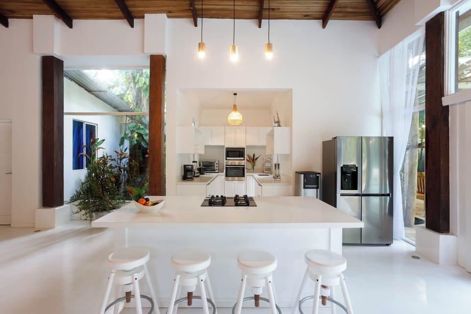 Villa Frida Offsite (1 km from hotel) | Private kitchen | Espresso maker, highchair
