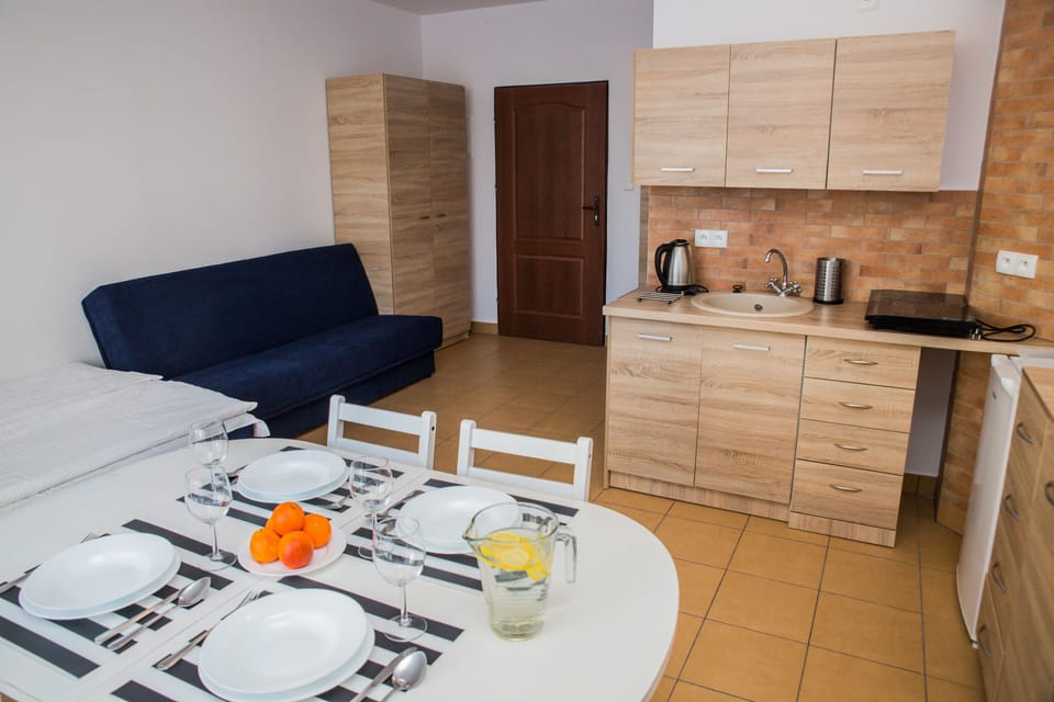 Apartment, 1 Bedroom, Balcony | Private kitchen | Fridge, stovetop, coffee/tea maker, electric kettle