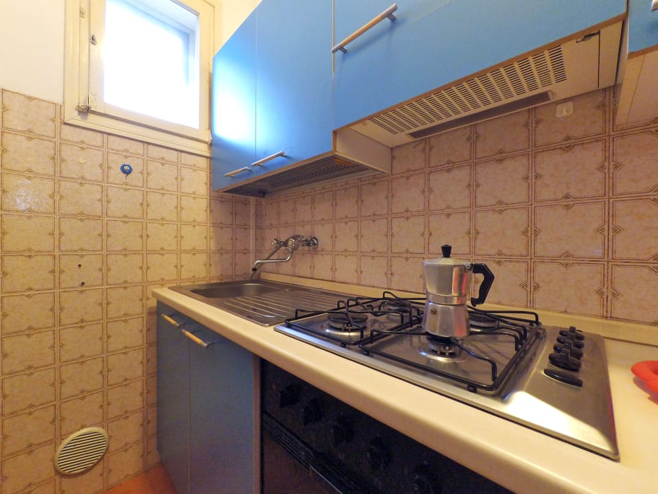 Apartment, 2 Bedrooms | Private kitchen | Full-size fridge, oven, stovetop, cookware/dishes/utensils