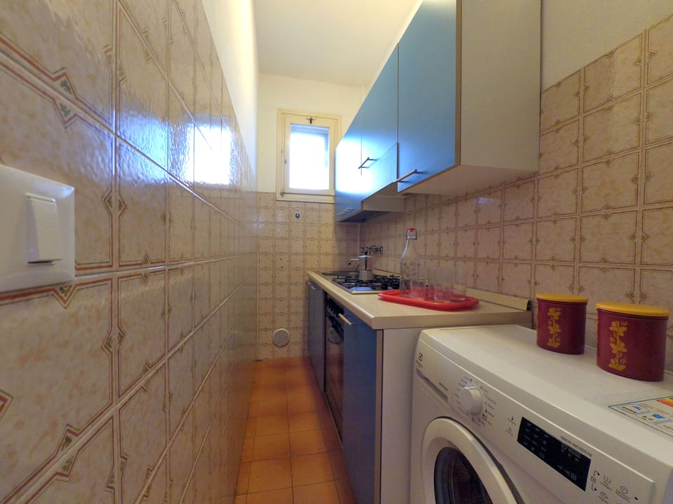 Apartment, 2 Bedrooms | Private kitchen | Full-size fridge, oven, stovetop, cookware/dishes/utensils