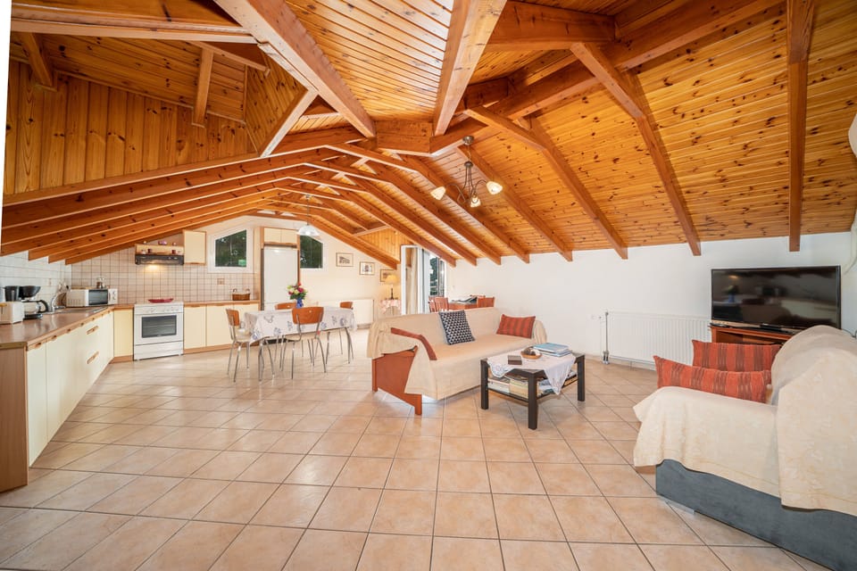 Luxury Apartment, 2 Bedrooms (Attic) | Living area | 32-inch LCD TV with satellite channels, TV, DVD player